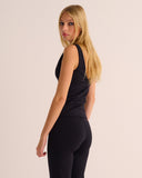 Comfortable hi-stretch wrap top that flatters the figure. 