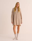 Mamu brushed alpaca blend piece is designed with an oversized drape that envelops the body in cloud-soft warmth.