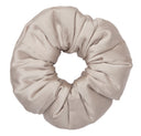 Beige scrunchie on a white background