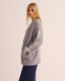 Mamu brushed alpaca cardigan with deep pockets for functionality. 
