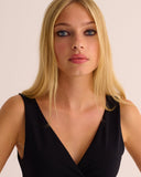 Mamu wrap dress  that strikes the perfect balance of softness and structure. 