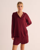 Mamu  100% organic stretch silk in a deep merlot tone, this piece channels retro ease with modern fluidity. 
