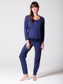 Model wearing Navy Printed Organic Cotton Henley Pyjama Set, front view